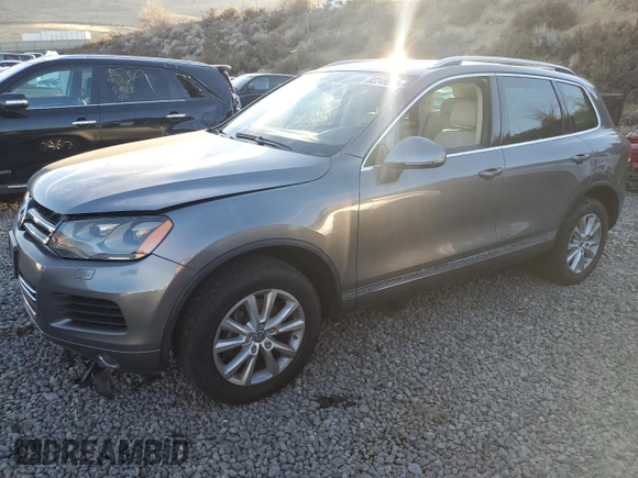 2013 Volkswagen Touareg Lux with VIN WVGEF9BPXDD002285, listed as a Copart auction lot 82248604 with 150,780 mi miles and Salvage Title. Bid and sale history available at DreamBid. Image 1.
