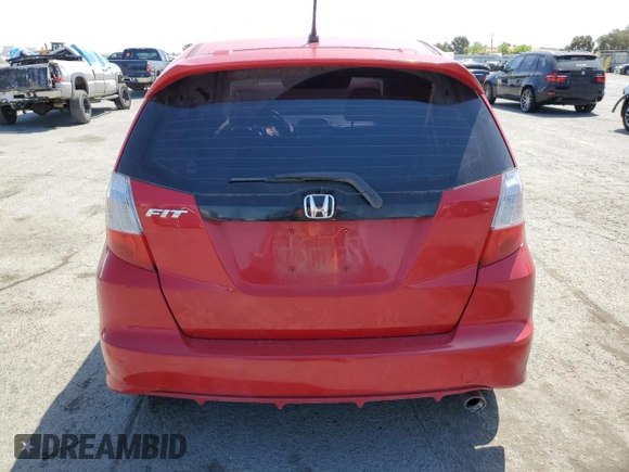 2013 Honda Fit Sport с VIN JHMGE8H57DC071259, выставлен на аукционе Copart как лот 55482135 с пробегом 115 322 миль миль и Списание • Salvage title. История ставок и продаж доступна на DreamBid. Изображение 6.