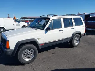 1996 Jeep Cherokee Sport with VIN 1J4FJ68S9TL234764, listed as a IAAI auction lot 41636731 with 129,732 mi miles. Bid and sale history available at carsss.com. Image 6.