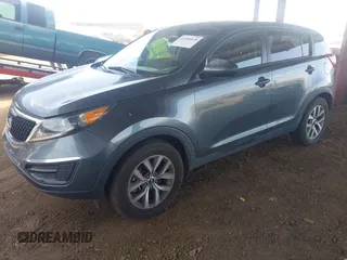 2014 Kia Sportage LX with VIN KNDPB3ACXE7588801, listed as a IAAI auction lot 42180018 with 192,062 mi miles and . Bid and sale history available at carsss.com. Image 2.