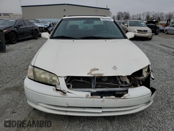 2001 Toyota Camry CE z VIN JT2BG22K210600687, wystawiony jako Copart lot #48807225 z przebiegiem 307 479 mil mil oraz Szkoda całkowita • Salvage title. Historia ofert i sprzedaży dostępna na DreamBid. Obrazek 5.
