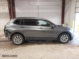 2018 Volkswagen Tiguan S with VIN 3VV1B7AX7JM106531, listed as a IAAI auction lot 41668403 with 119,885 mi miles. Bid and sale history available at carsss.com. Image 14.