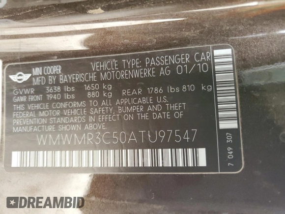 2010 MINI Convertible with VIN WMWMR3C50ATU97547, listed as a Copart auction lot 44780185 with 91,194 mi miles and Salvage Title. Bid and sale history available at DreamBid. Image 12.