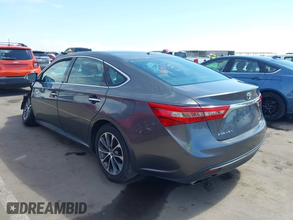 2018 Toyota Avalon XLE with VIN 4T1BK1EB5JU276828, listed as a IAAI auction lot 42141640 with 75,815 mi miles. Bid and sale history available at carsss.com. Image 3.