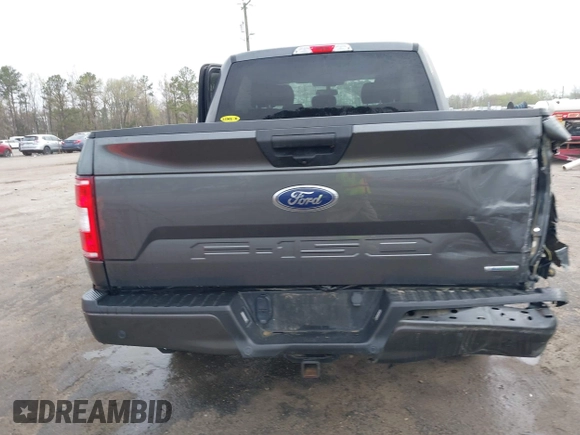 2020 Ford F-150 XL with VIN 1FTEW1EP4LFA55536, listed as a IAAI auction lot 41923442 with 99,859 mi miles and . Bid and sale history available at DreamBid. Image 16.