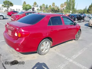 2009 Toyota Corolla with VIN 1NXBU40E99Z089505, listed as a IAAI auction lot 39832879 with 197,912 mi miles. Bid and sale history available at carsss.com. Image 4.