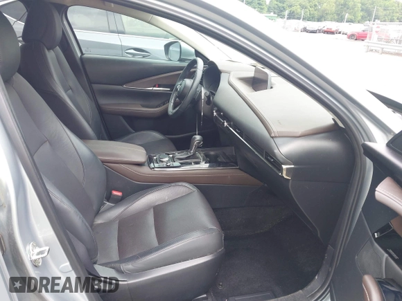 2021 Mazda CX-30 Premium with VIN 3MVDMADL7MM252507, listed as a IAAI auction lot 42338625 with 44,537 mi miles and . Bid and sale history available at DreamBid. Image 5.