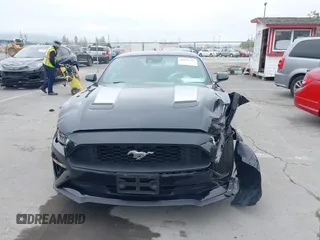 2022 Ford Mustang EcoBoost with VIN 1FA6P8THXN5145312, listed as a IAAI auction lot 42075186 with 28,233 mi miles and . Bid and sale history available at DreamBid. Image 6.