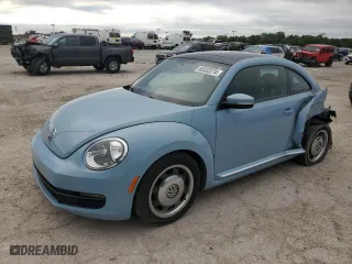 2012 Volkswagen Beetle 2.5L w/Sun PZEV with VIN 3VWJP7AT1CM662704, listed as a Copart auction lot 63332274 with 100,059 mi miles and Salvage Title. Bid and sale history available at carsss.com. Image 1.