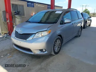 2011 Toyota Sienna XLE AAS with VIN 5TDYK3DC1BS007820, listed as a IAAI auction lot 41935200 with 123,554 mi miles. Bid and sale history available at carsss.com. Image 2.