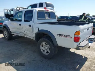 2001 Toyota Tacoma PreRunner z VIN 5TEGN92N91Z852586, wystawiony jako IAAI lot #42299321 z przebiegiem 233 111 mil mil oraz . Historia ofert i sprzedaży dostępna na DreamBid. Obrazek 3.