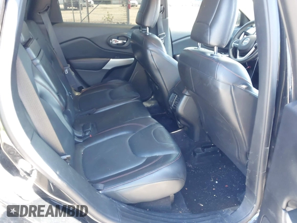 2018 Jeep Cherokee Trailhawk Leather Plus with VIN 1C4PJMBXXJD572667, listed as a IAAI auction lot 42216477 with 85,890 mi miles and . Bid and sale history available at DreamBid. Image 8.