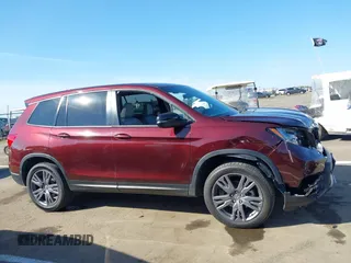 2021 Honda Passport EX-L z VIN 5FNYF8H5XMB007951, wystawiony jako IAAI lot #41776701 z przebiegiem 41 253 mil mil oraz . Historia ofert i sprzedaży dostępna na DreamBid. Obrazek 13.
