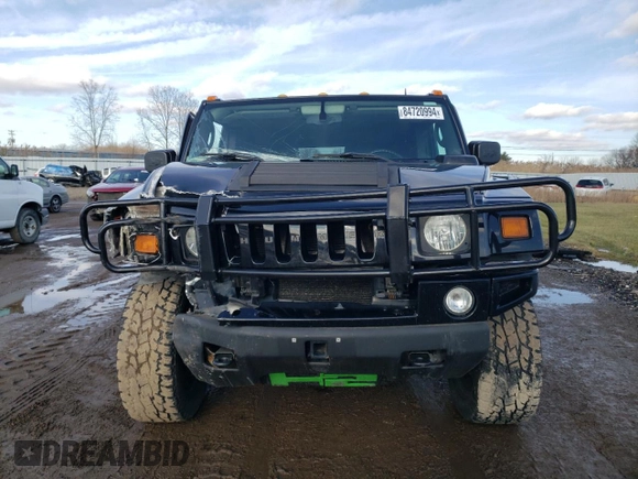 2005 Hummer H2 SUV with VIN 5GRGN23U35H111403, listed as a Copart auction lot 84720994 with 142,159 mi miles and Salvage Title. Bid and sale history available at carsss.com. Image 5.
