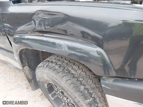 2003 Chevrolet Silverado 1500 LS with VIN 2GCEK19T131198891, listed as a IAAI auction lot 41984062 with 179,986 mi miles. Bid and sale history available at carsss.com. Image 6.