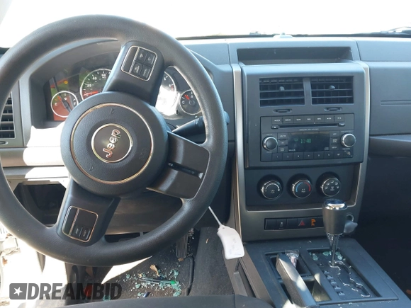 2012 Jeep Liberty Sport with VIN 1C4PJLAK7CW213834, listed as a IAAI auction lot 41353723 with 220,371 mi miles and . Bid and sale history available at DreamBid. Image 16.