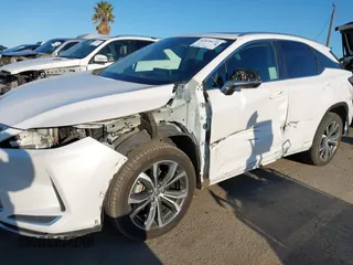 2022 Lexus RX with VIN 2T2HGMDA8NC074588, listed as a IAAI auction lot 41828234 with 106,845 mi miles. Bid and sale history available at carsss.com. Image 6.