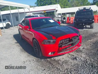 2013 Dodge Charger SXT with VIN 2C3CDXHGXDH742942, listed as a IAAI auction lot 42025564 with 292,681 mi miles. Bid and sale history available at carsss.com. Image 1.