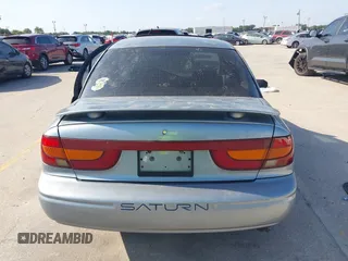 2002 Saturn SL z VIN 1G8ZK54702Z130021, wystawiony jako IAAI lot #42091064 z przebiegiem 68 754 mil mil oraz . Historia ofert i sprzedaży dostępna na DreamBid. Obrazek 16.