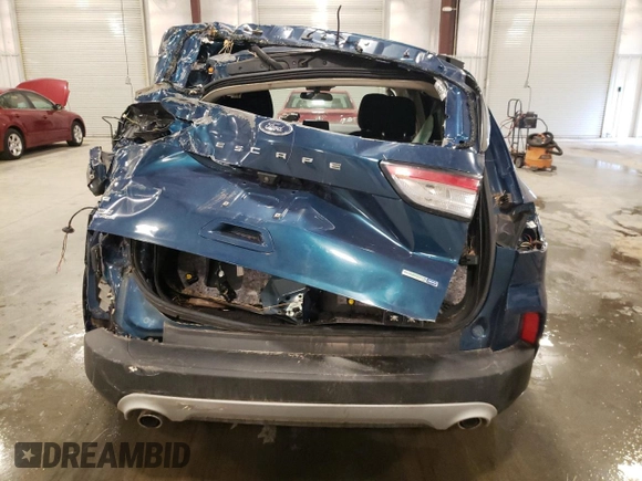 2020 Ford Escape SE z VIN 1FMCU9G61LUB21662, wystawiony jako Copart lot #54783075 z przebiegiem 51 589 mil mil oraz Nie do naprawy • Non repairable. Historia ofert i sprzedaży dostępna na DreamBid. Obrazek 6.