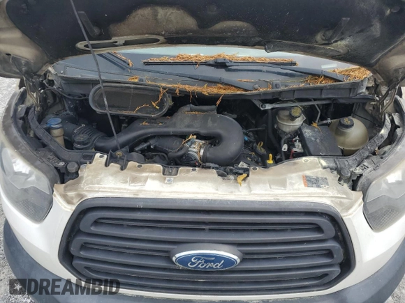 2017 Ford Transit z VIN 1FTYR2CM1HKB02605, wystawiony jako Copart lot #59355545 z przebiegiem Nie podano mil oraz Szkoda całkowita • Salvage title. Historia ofert i sprzedaży dostępna na DreamBid. Obrazek 12.