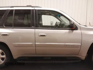 2004 GMC Envoy SLE with VIN 1GKDT13S042243883, listed as a IAAI auction lot 41795335 with 162,873 mi miles. Bid and sale history available at carsss.com. Image 13.
