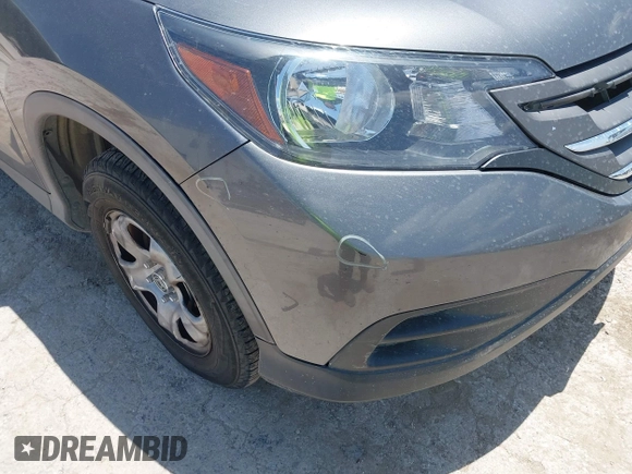 2013 Honda CR-V LX with VIN 3CZRM3H37DG708916, listed as a IAAI auction lot 42450090 with 118,002 mi miles and . Bid and sale history available at DreamBid. Image 21.