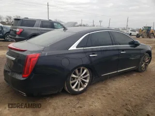 2013 Cadillac XTS Luxury with VIN 2G61P5S38D9147329, listed as a Copart auction lot 42509835 with 133,018 mi miles and Salvage title. Bid and sale history available at DreamBid. Image 3.
