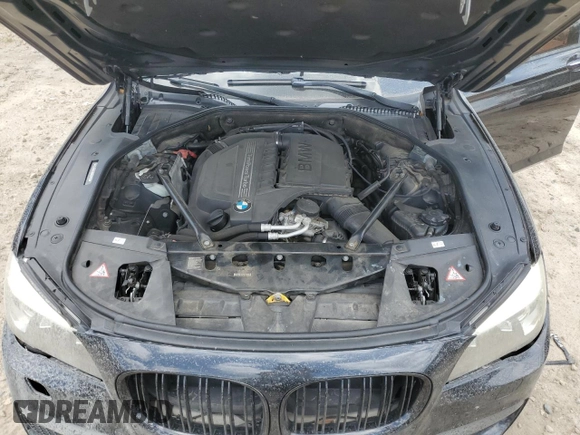 2014 BMW 7 Series 740Li with VIN WBAYE4C53ED137952, listed as a Copart auction lot 62829515 with 151,160 mi miles and Salvage title. Bid and sale history available at DreamBid. Image 11.