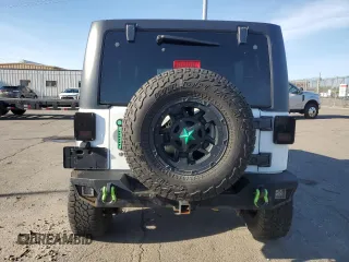 2015 Jeep Wrangler Unlimited Rubicon z VIN 1C4BJWFG7FL547951, wystawiony jako Copart lot #55268705 z przebiegiem 141 018 mil mil oraz Czysty tytuł • Clean title. Historia ofert i sprzedaży dostępna na DreamBid. Obrazek 6.