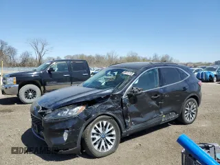 2020 Ford Escape Titanium с VIN 1FMCU9J97LUA55895, выставлен на аукционе Copart как лот 53058785 с пробегом 70 988 миль миль и Списание • Salvage title. История ставок и продаж доступна на DreamBid. Изображение 1.