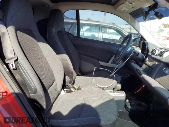 2014 Smart fortwo Passion z VIN WMEEJ9AA6EK792201, wystawiony jako Copart lot #74756574 z przebiegiem 17 282 mil mil oraz Szkody całkowita. Historia ofert i sprzedaży dostępna na DreamBid. Obrazek 10.