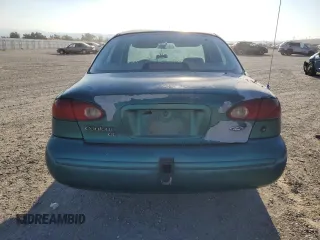 1997 Ford Contour z VIN 3FALP6536VM113346, wystawiony jako Copart lot #70036024 z przebiegiem 115 084 mil mil oraz Tytuł czysty. Historia ofert i sprzedaży dostępna na DreamBid. Obrazek 6.