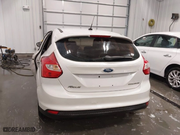 2012 Ford Focus Titanium with VIN 1FAHP3N26CL122364, listed as a IAAI auction lot 41777664 with NaN miles. Bid and sale history available at carsss.com. Image 16.
