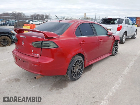 2016 Mitsubishi Lancer GT with VIN JA32U8FW1GU012988, listed as a IAAI auction lot 41498905 with 94,727 mi miles. Bid and sale history available at carsss.com. Image 4.