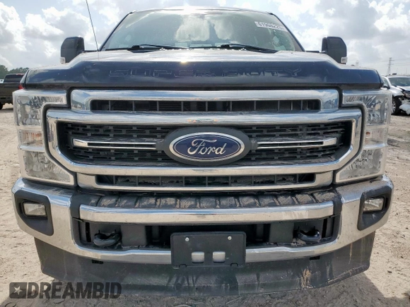 2021 Ford F-250 XL with VIN 1FT7W2BT6MEC47760, listed as a Copart auction lot 61908225 with 111,015 mi miles and Salvage title. Bid and sale history available at DreamBid. Image 5.