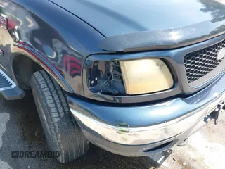 2001 Ford F-150 XLT with VIN 1FTRW08L71KC63676, listed as a IAAI auction lot 42536000 with 326,699 mi miles and . Bid and sale history available at DreamBid. Image 6.