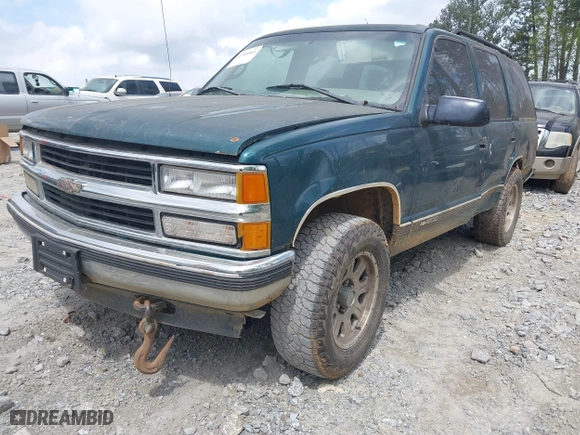 1995 Chevrolet Tahoe with VIN 1GNEK13K3SJ412971, listed as a IAAI auction lot 41940461 with 425,128 mi miles. Bid and sale history available at carsss.com. Image 2.