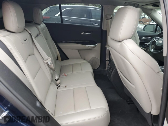 2021 Cadillac XT4 FWD Premium Luxury z VIN 1GYFZCR48MF056210, wystawiony jako Copart lot #45818245 z przebiegiem Nie podano mil oraz Nie do naprawy • Non repairable. Historia ofert i sprzedaży dostępna na DreamBid. Obrazek 11.