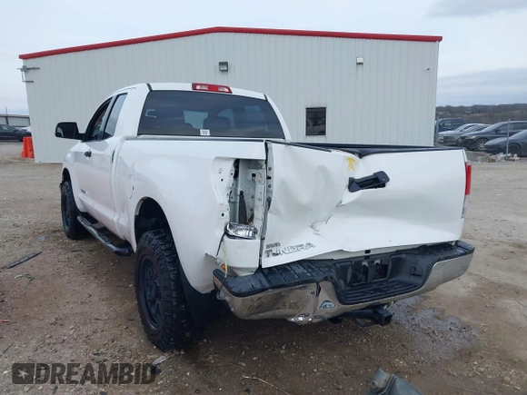 2013 Toyota Tundra z VIN 5TFRM5F19DX064236, wystawiony jako IAAI lot #41701170 z przebiegiem 147 312 mil mil oraz . Historia ofert i sprzedaży dostępna na DreamBid. Obrazek 3.