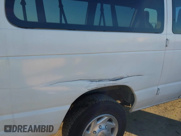 2011 Ford Econoline Passenger XL with VIN 1FBNE3BL0BDA75121, listed as a IAAI auction lot 41469640 with 105,558 mi miles. Bid and sale history available at carsss.com. Image 6.