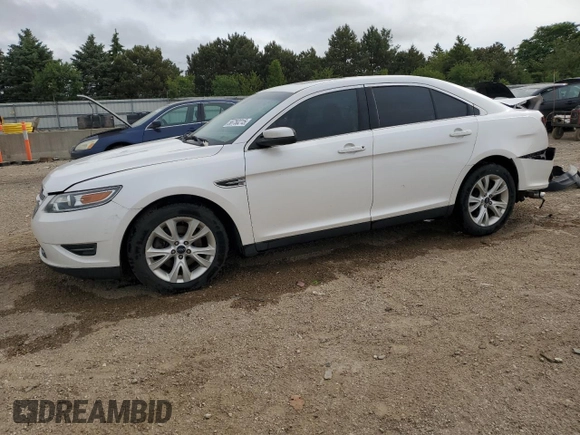 2012 Ford Taurus SEL z VIN 1FAHP2EW8CG138653, wystawiony jako Copart lot #56750215 z przebiegiem 159 631 mil mil oraz Szkoda całkowita • Salvage title. Historia ofert i sprzedaży dostępna na DreamBid. Obrazek 1.