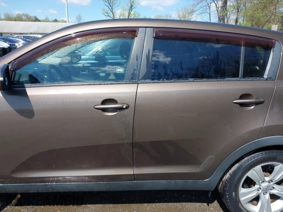 2012 Kia Sportage LX with VIN KNDPBCA27C7293143, listed as a IAAI auction lot 41980919 with 206,457 mi miles and . Bid and sale history available at DreamBid. Image 14.