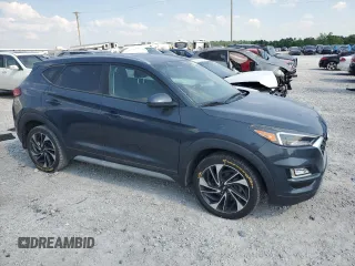 2020 Hyundai Tucson Sport with VIN KM8J3CAL2LU273598, listed as a Copart auction lot 59100775 with 77,954 mi miles and Salvage title. Bid and sale history available at DreamBid. Image 4.