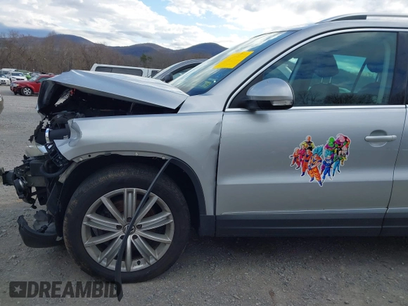 2012 Volkswagen Tiguan SE with VIN WVGAV7AX2CW543003, listed as a IAAI auction lot 41803970 with 187,639 mi miles and . Bid and sale history available at DreamBid. Image 12.