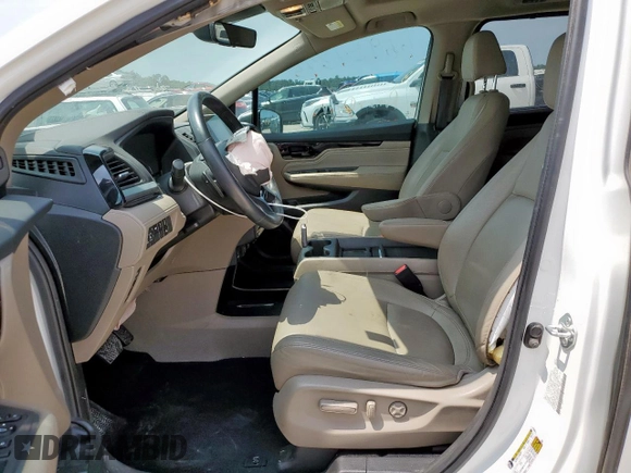 2023 Honda Odyssey Touring с VIN 5FNRL6H8XPB001311, выставлен на аукционе Copart как лот 56924345 с пробегом 77 736 миль миль и Списание • Salvage title. История ставок и продаж доступна на DreamBid. Изображение 7.