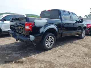 2018 Ford F-150 XL with VIN 1FTEW1EP1JKD05142, listed as a IAAI auction lot 42473177 with 99,079 mi miles and . Bid and sale history available at DreamBid. Image 4.