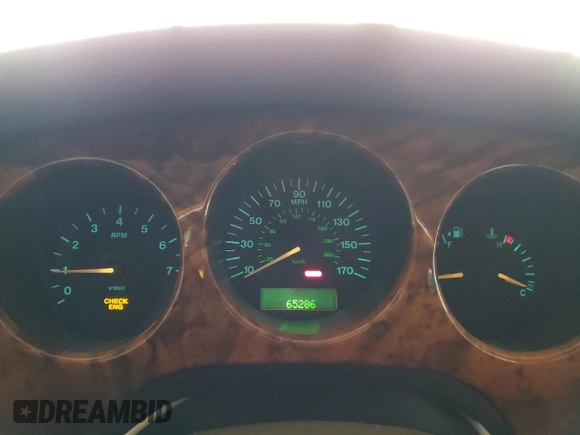 1999 Jaguar XJ with VIN SAJKX6046XC855872, listed as a Copart auction lot 47060465 with 65,286 mi miles and Clean title. Bid and sale history available at DreamBid. Image 9.
