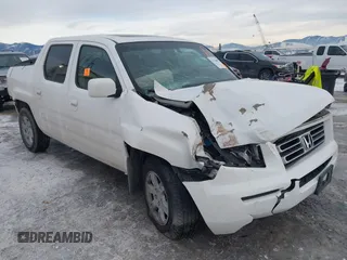 2006 Honda Ridgeline RTL z VIN 2HJYK16546H518408, wystawiony jako IAAI lot #41326047 z przebiegiem Nie podano mil oraz . Historia ofert i sprzedaży dostępna na DreamBid. Obrazek 1.
