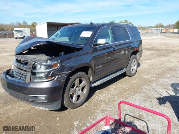 2015 Chevrolet Tahoe LTZ with VIN 1GNSKCKC3FR640615, listed as a IAAI auction lot 40843080 with 142,445 mi miles. Bid and sale history available at carsss.com. Image 17.